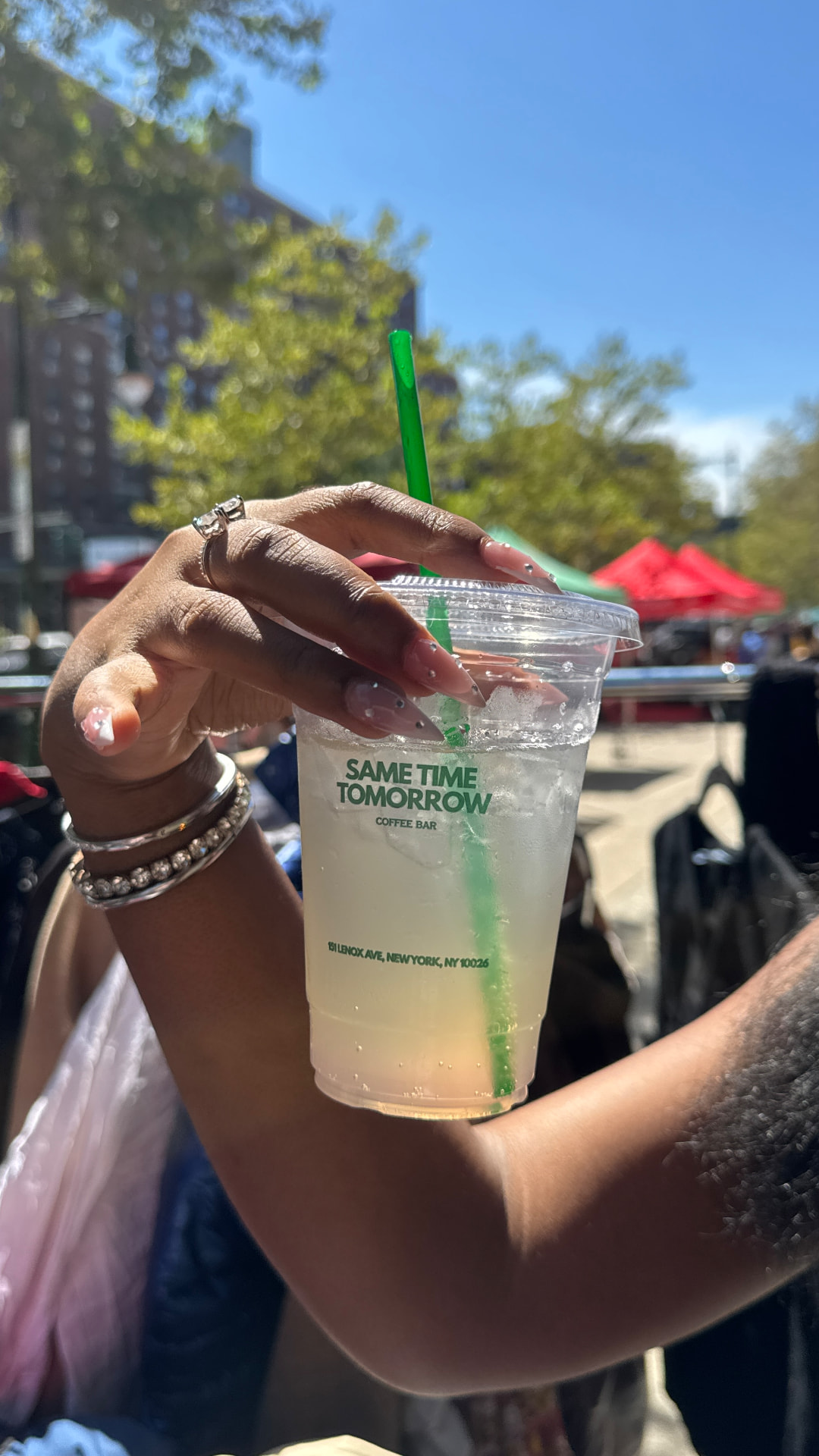 Iced drink from Same Time Tomorrow Coffee Bar held up at the event